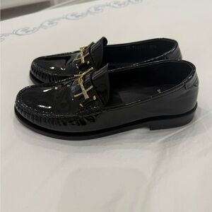 Saint Laurent Glossy Black Loafers with Gold Detail